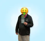 Winner Brandon L. holds a scratchcard in his hands